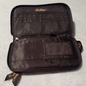 An Authentic Vera Bradley handbag and wallet